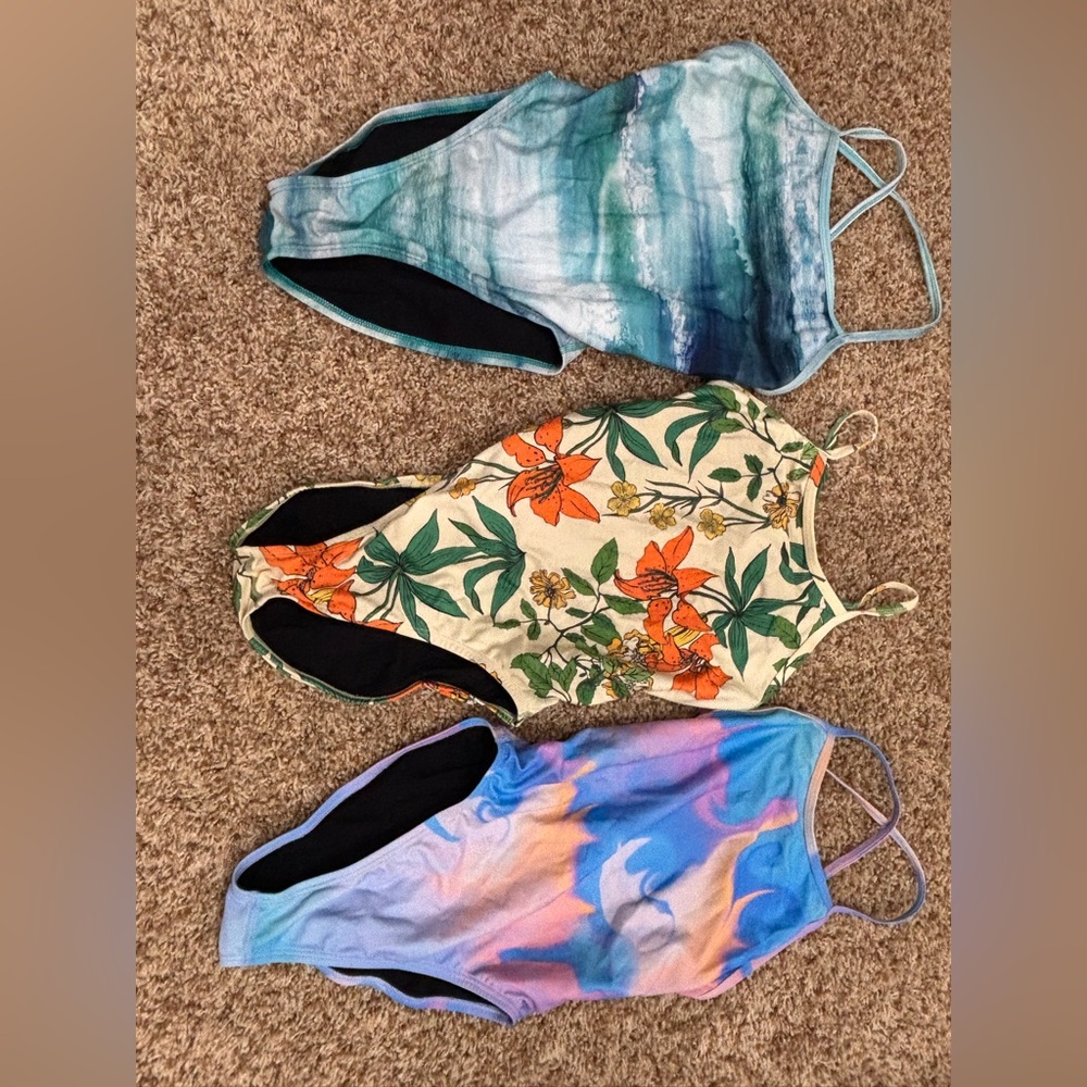 LOT OF JOLYN ONE PIECE SWIM SUITS. 3 fixed back performance swim suits